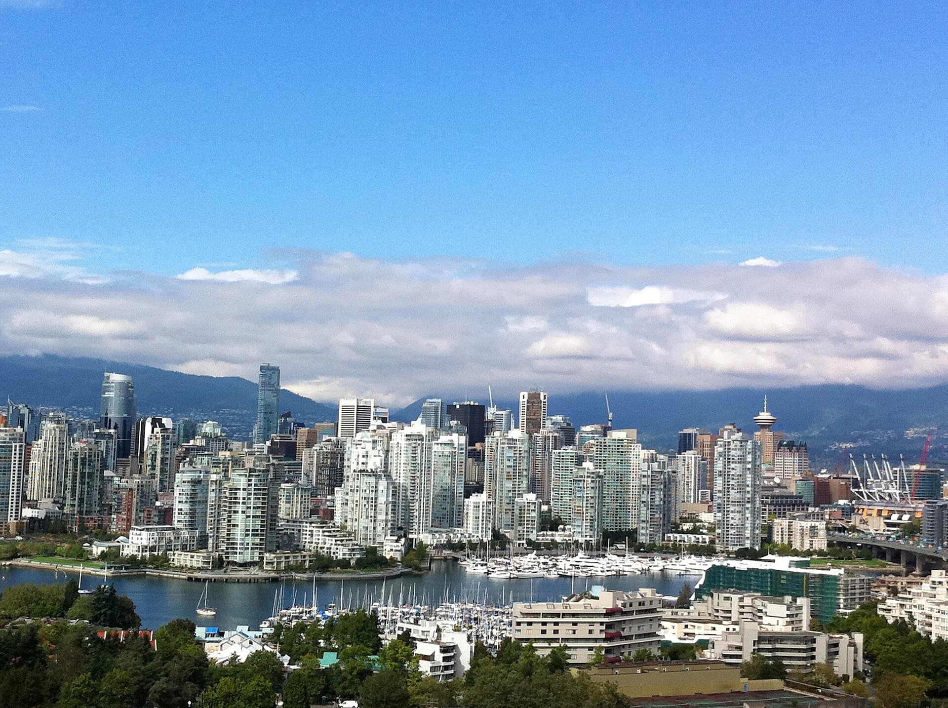 Downtown Vancouver skyline with the North Shore mountains behind False Creek